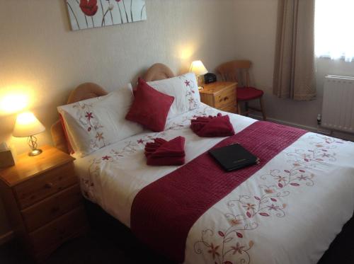 Cama o camas de una habitación en Chelmsford Place Guest House