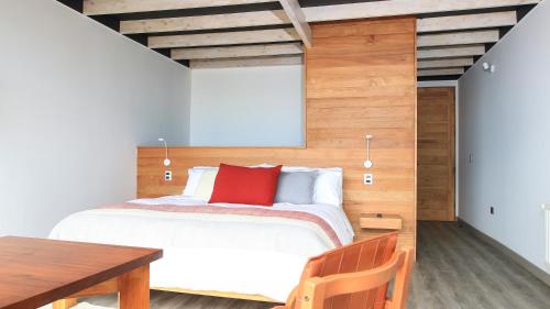 Giường trong phòng chung tại CASA NEGRA SANTO DOMINGO