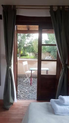 Ένα ή περισσότερα κρεβάτια σε δωμάτιο στο Terraza del Molle