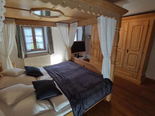 Postel nebo postele na pokoji v ubytování Ferienhaus Bichler