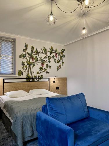 Ένα ή περισσότερα κρεβάτια σε δωμάτιο στο Altrimo Hotel