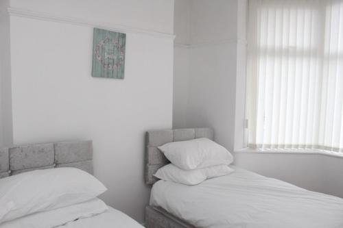 Un pat sau paturi într-o cameră la Morning Star Home