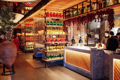 a store filled with lots of bottles of wine at Hotel Complex Rybinsk in Rybinsk