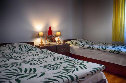 
Tempat tidur dalam kamar di Apartamenty w Dolinie Gościna
