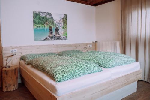 A bed or beds in a room at Haus Renswouw