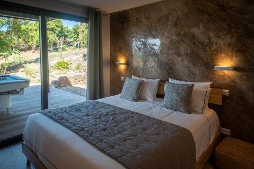 Voodi või voodid majutusasutuse Domaine de Sweet Hill - 4 villas et 2 studios toas
