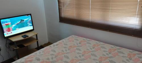 TV o dispositivi per l'intrattenimento presso Citra Cottage Homestay