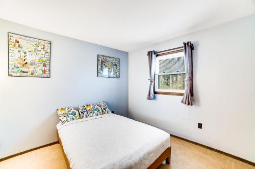 Katil atau katil-katil dalam bilik di Antler Lake House