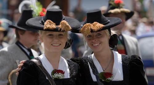 two women in hats are standing next to each other at Hotel Restaurant Sidan in Schwendau