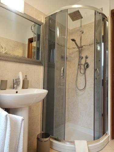 a bathroom with a shower and a sink at Al Cristo in Cividale del Friuli
