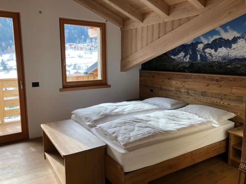 Postel nebo postele na pokoji v ubytování B&B el Benel