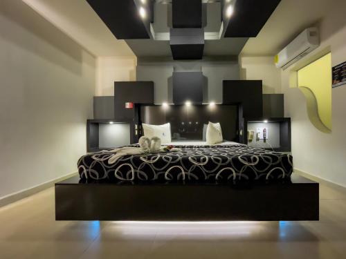 Auto Hotel Mediterráneoにあるベッド
