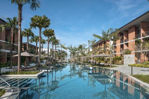 Swimmingpoolen hos eller tæt på Pullman Khao Lak Resort
