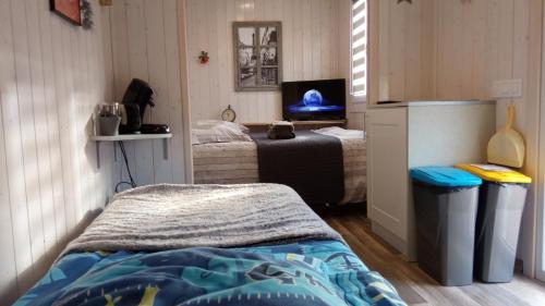 Postel nebo postele na pokoji v ubytování B&B du Cerisier, diner sur demande