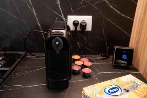 a black stimulator at Deluxe Aparthotel MARWELL RESIDENCE in Suceava
