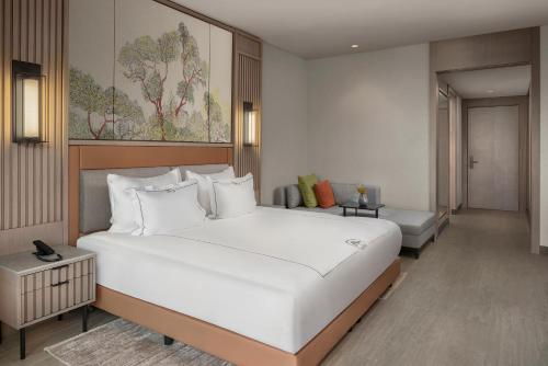 Una cama o camas en una habitación de NG Phaselis Bay