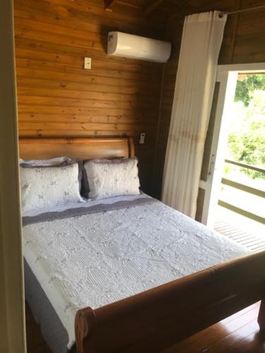 Postel nebo postele na pokoji v ubytování Espetacular sítio com belíssima paisagem para descansar