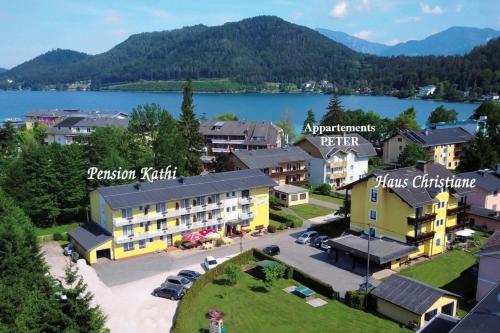 an aerial view of a resort with a lake at Appartements Peter in Sankt Kanzian