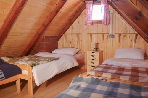 Llit o llits en una habitació de CHALET Kocna - I FEEL ALPS