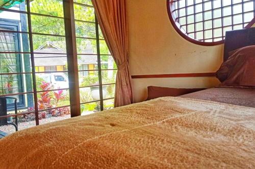 Katil atau katil-katil dalam bilik di Designer Villa Tokyo