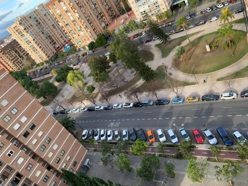 an aerial view of a city street with parked cars at Habitación con cama doble, piso compartido en Avenida Blasco Ibáñez in Valencia