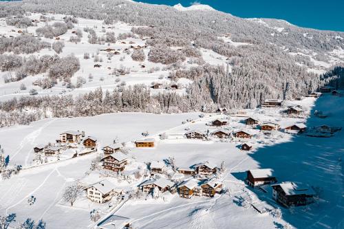 an aerial view of a resort in the snow at Appartments Urmonti in Schruns