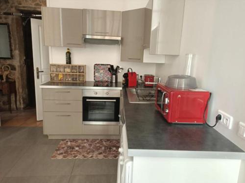 Kuchyň nebo kuchyňský kout v ubytování Coeur Vieux Lyon, 60 M2 lumineux tout confort