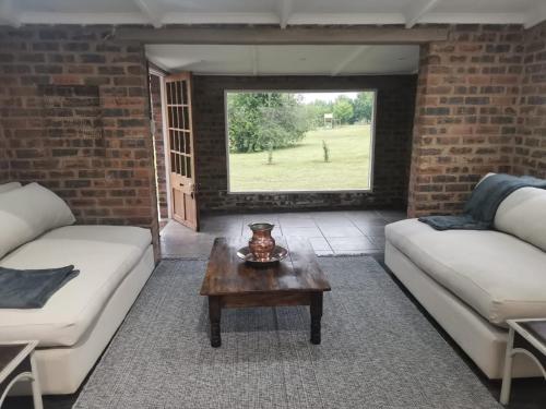 منطقة جلوس في Lionsgate Estate Cottage