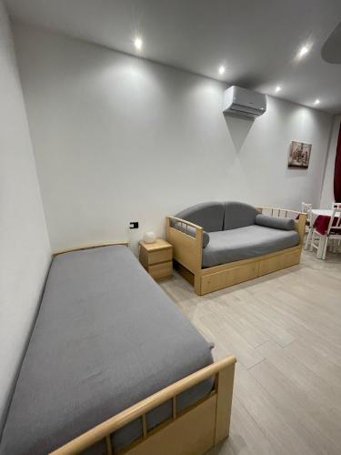Una cama o camas en una habitación de Alice sweet home