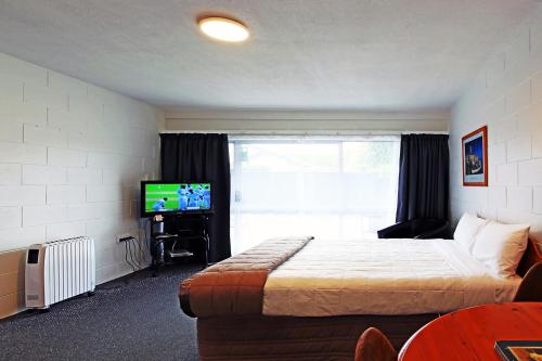 Postel nebo postele na pokoji v ubytování 289 Midway Motel