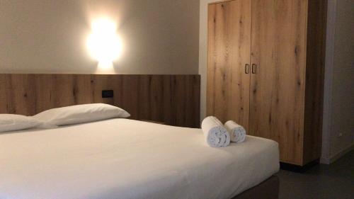 Кровать или кровати в номере Hotel Doria - Business & Bike Hotel