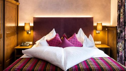 Katil atau katil-katil dalam bilik di Hotel & Chalet Montana