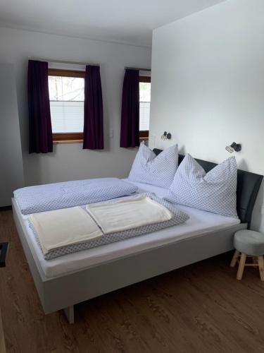 Кровать или кровати в номере Appartments Zirbennest