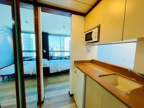 Kuchyň nebo kuchyňský kout v ubytování C Tower Apartments