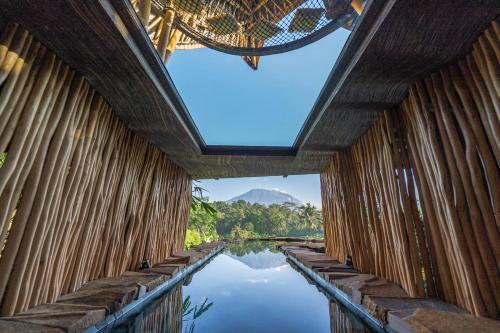 A view of the pool at Veluvana Bali or nearby