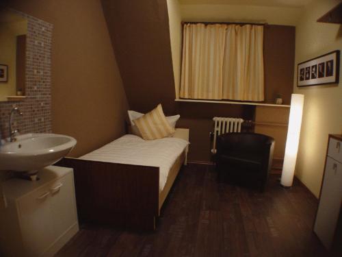Postel nebo postele na pokoji v ubytování Hotel Palatino