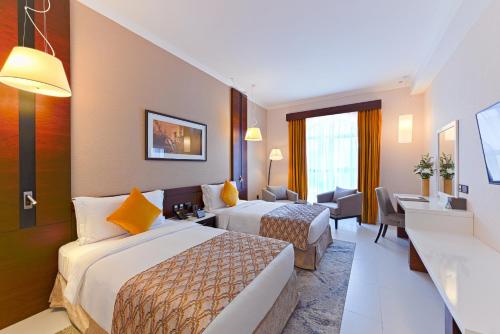 Postel nebo postele na pokoji v ubytování TIME Asma Hotel