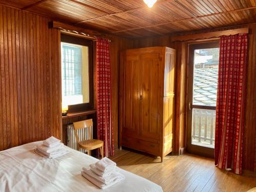 Posteľ alebo postele v izbe v ubytovaní Chalet Motta