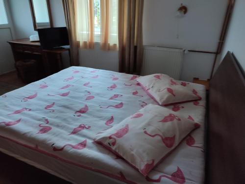 Un pat sau paturi într-o cameră la Vila Brazilor