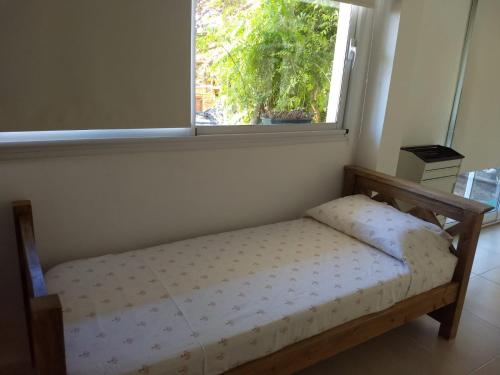 Łóżko lub łóżka w pokoju w obiekcie La Isla Ostende