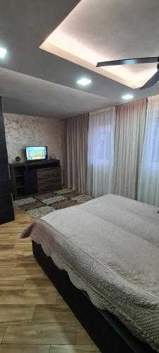 Ένα ή περισσότερα κρεβάτια σε δωμάτιο στο Afrodita