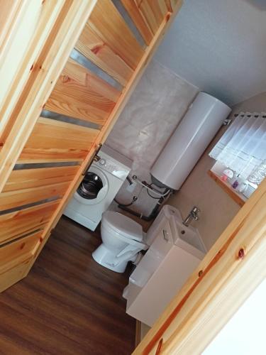 an overhead view of a bathroom with a toilet and sink at Apartmán Vladimír - Liptov in Bukovina