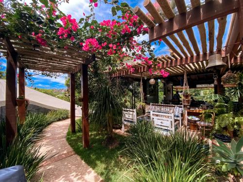 Κήπος έξω από το Pousada Villa Canaã