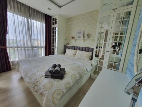 Кровать или кровати в номере Love & Relax Balcony near WON Beach