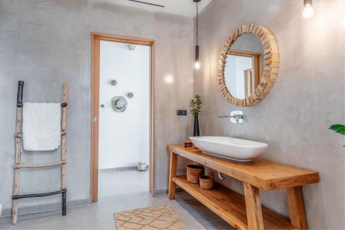 A bathroom at Luxury Villa Terra Promessa - Paxos
