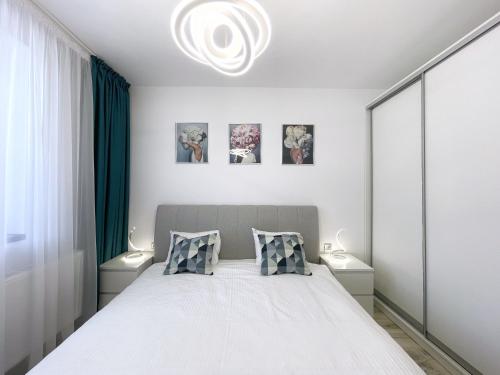 מיטה או מיטות בחדר ב-Perfect View Apartment