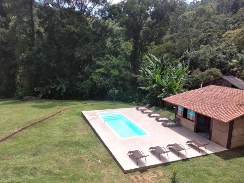 La alberca dentro o cerca de Pousada Pizzaria do Vale