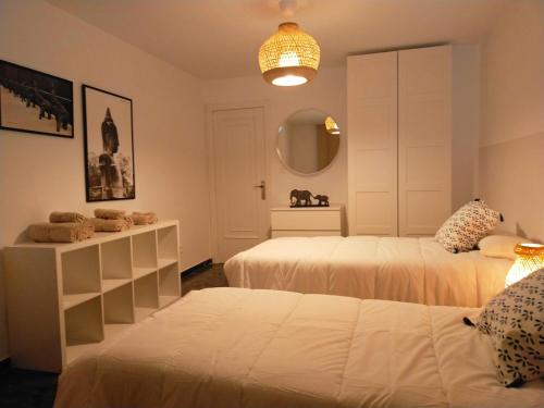 Кровать или кровати в номере LC Gran Vía