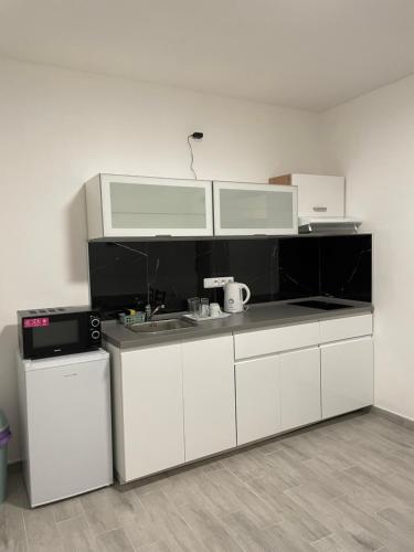 Una cocina o zona de cocina en Apartmant T&T