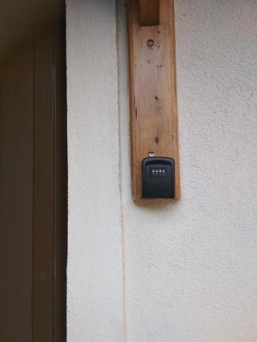 a lightswitch on the side of a wall at Breakfast & Snacks, 2bedrooms 2bathrooms House in Kato Zachlorou